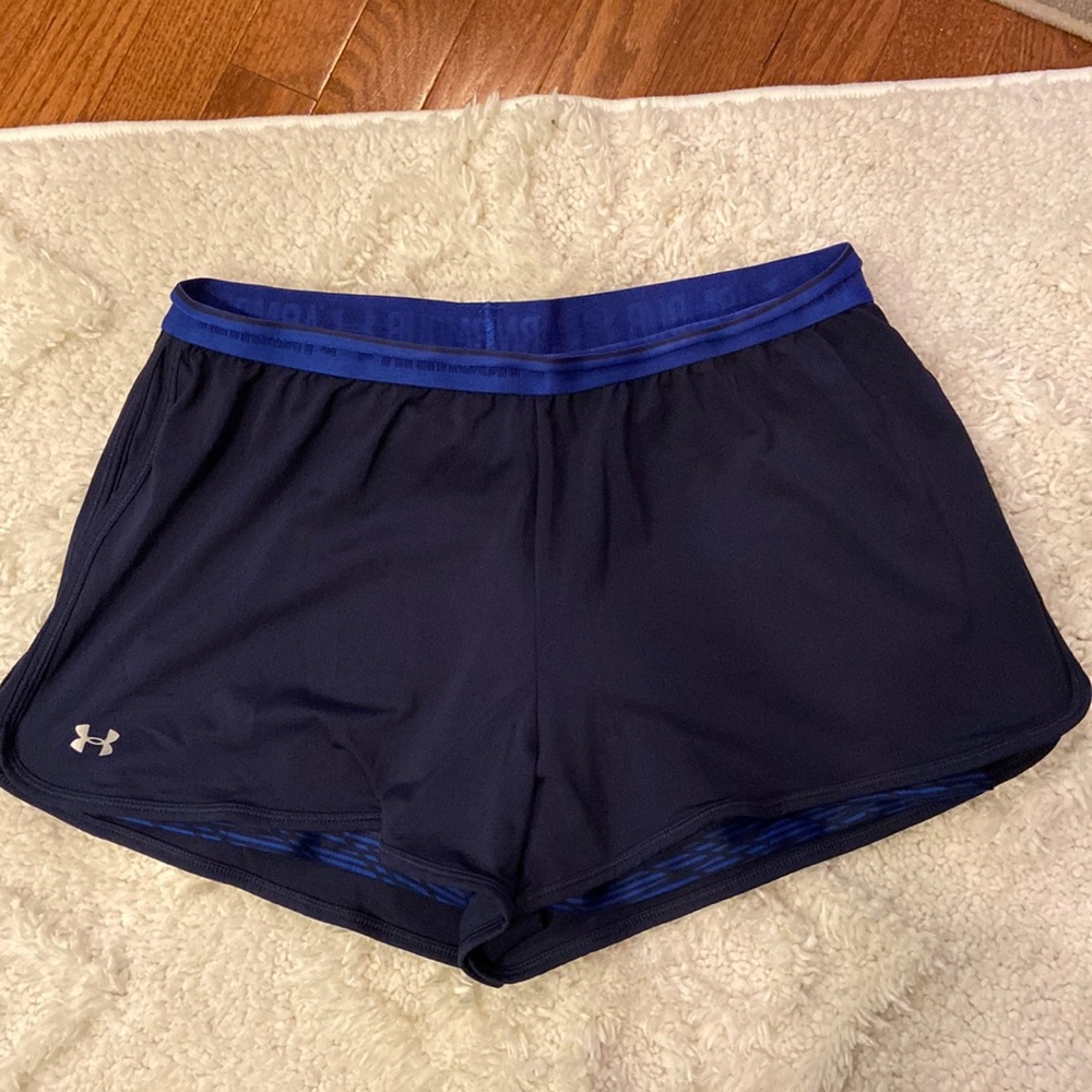 Under Armour women’s running shorts in size large. Did